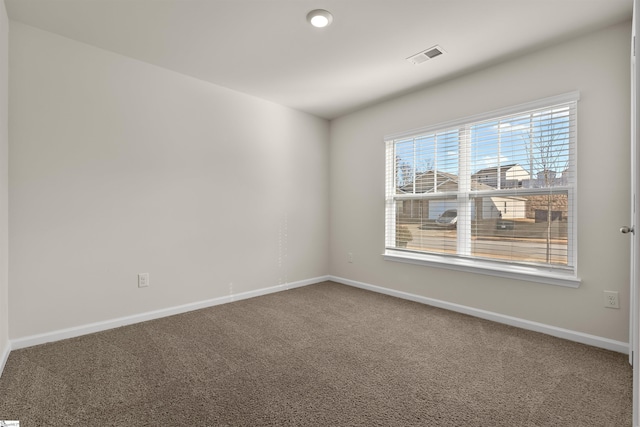 view of carpeted spare room