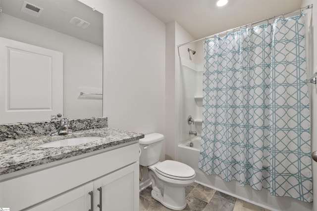 full bathroom featuring shower / bath combination with curtain, toilet, and vanity