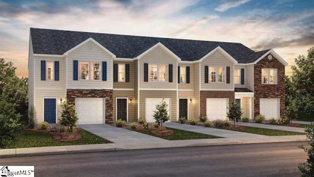 view of front of home with a garage