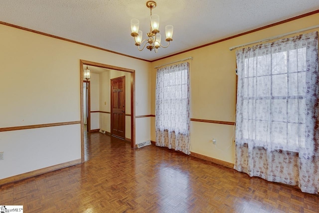 empty room featuring a chandelier, a textured ceiling, and dark parquet floors