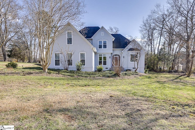 view of front of home with a front yard