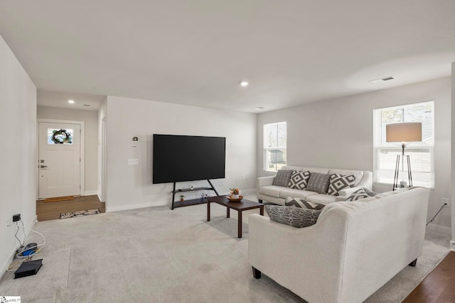 living room with light hardwood / wood-style floors