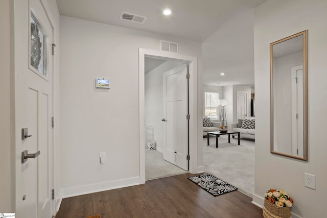 hallway featuring hardwood / wood-style flooring