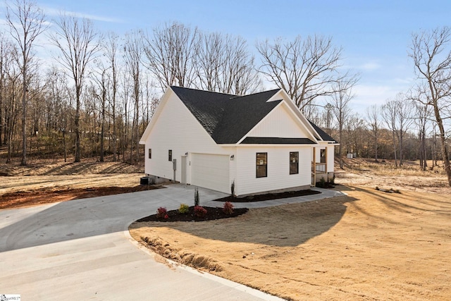 view of property exterior featuring a garage