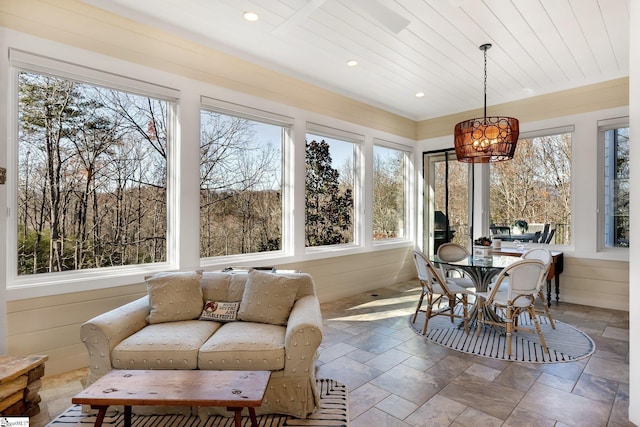 sunroom / solarium with wood ceiling