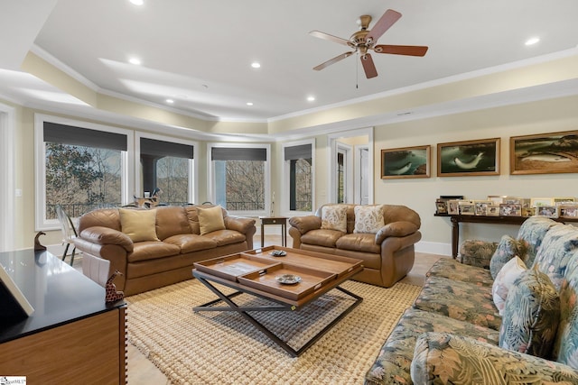 living room featuring ceiling fan, light hardwood / wood-style flooring, and ornamental molding