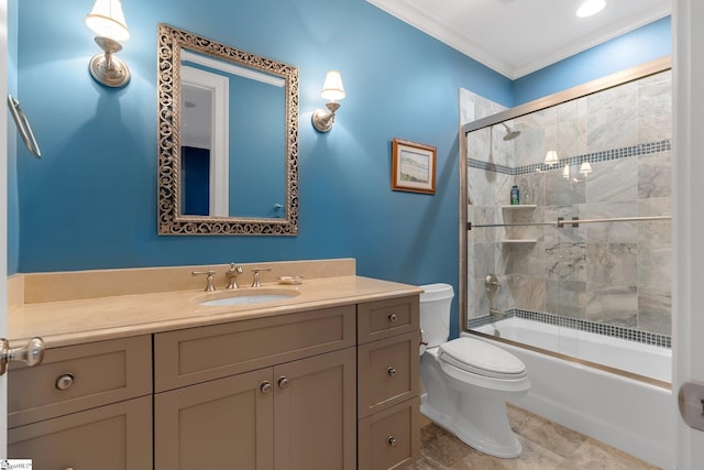 full bathroom with crown molding, toilet, vanity, and combined bath / shower with glass door