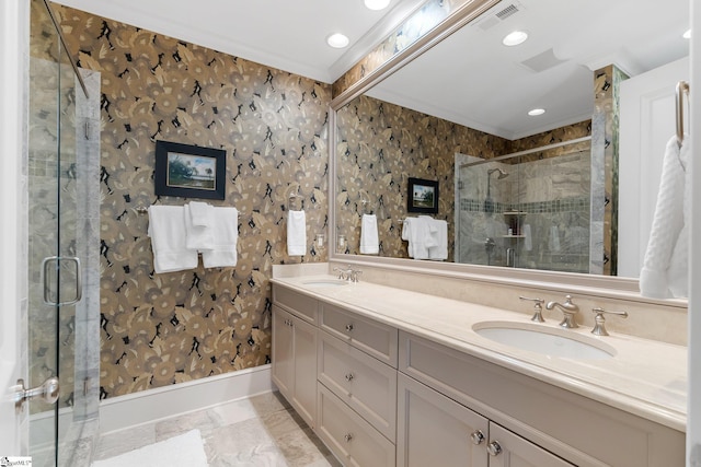 bathroom featuring vanity, an enclosed shower, and ornamental molding