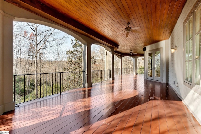 deck with ceiling fan and french doors