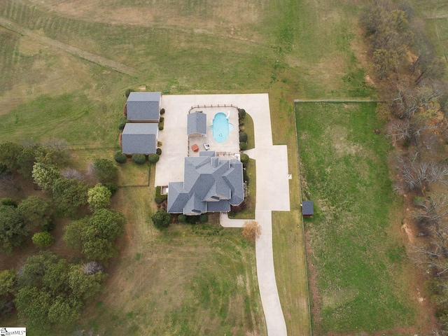 birds eye view of property featuring a rural view