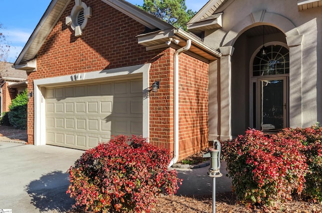 view of side of home featuring a garage