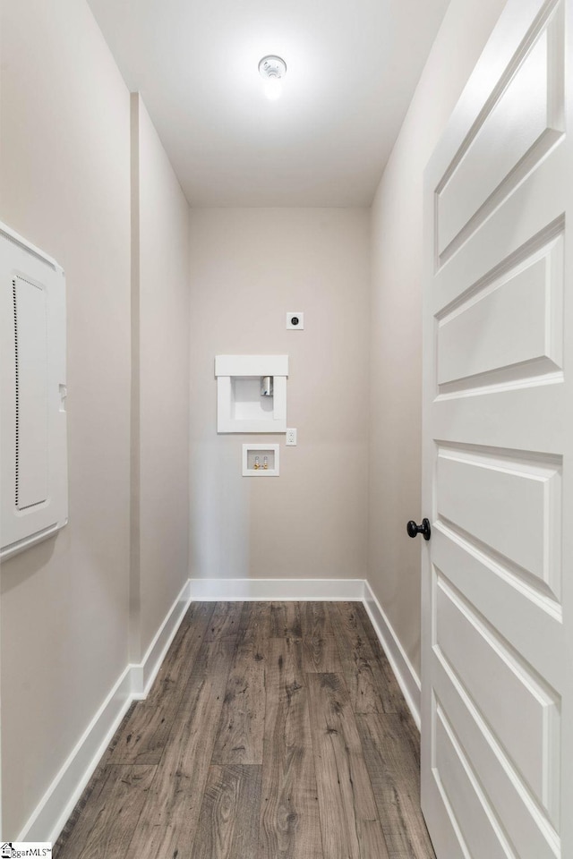 laundry area featuring hookup for a washing machine, dark hardwood / wood-style floors, and hookup for an electric dryer