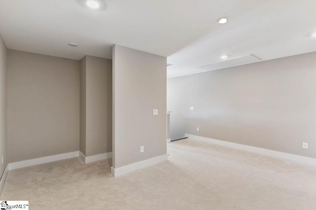 basement with light colored carpet