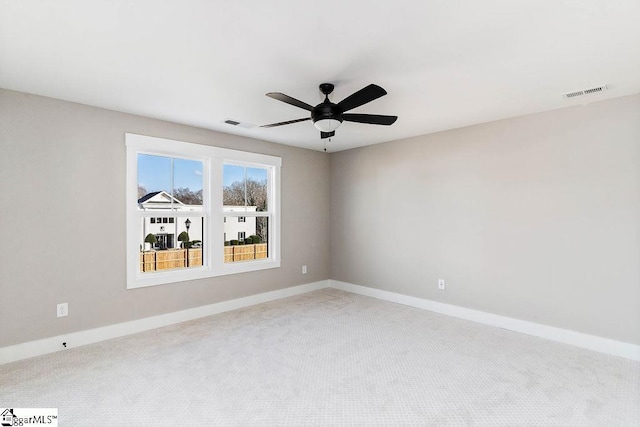 unfurnished room featuring carpet floors and ceiling fan