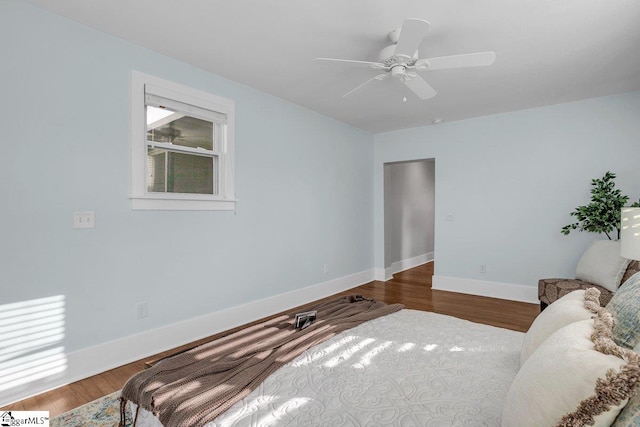 bedroom featuring hardwood / wood-style flooring and ceiling fan