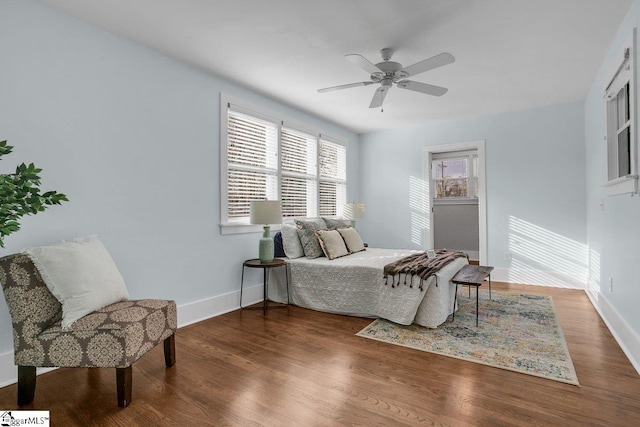 bedroom featuring ceiling fan and hardwood / wood-style flooring