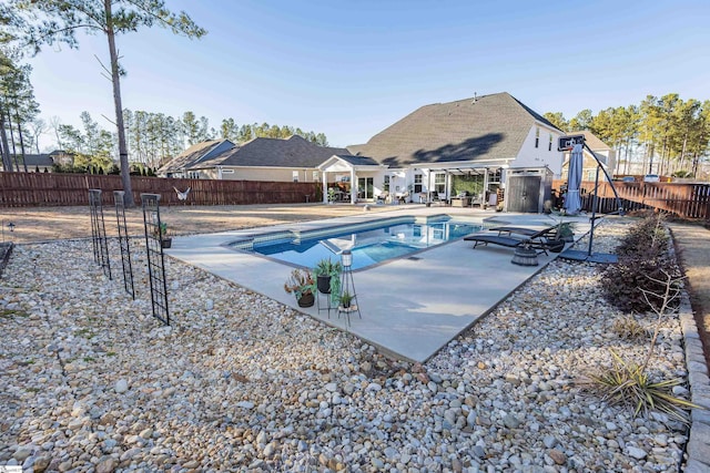 view of pool featuring a patio area