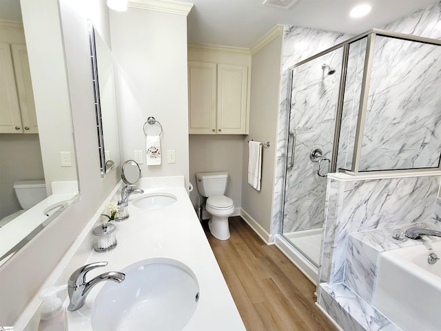 full bathroom with separate shower and tub, hardwood / wood-style floors, vanity, and toilet