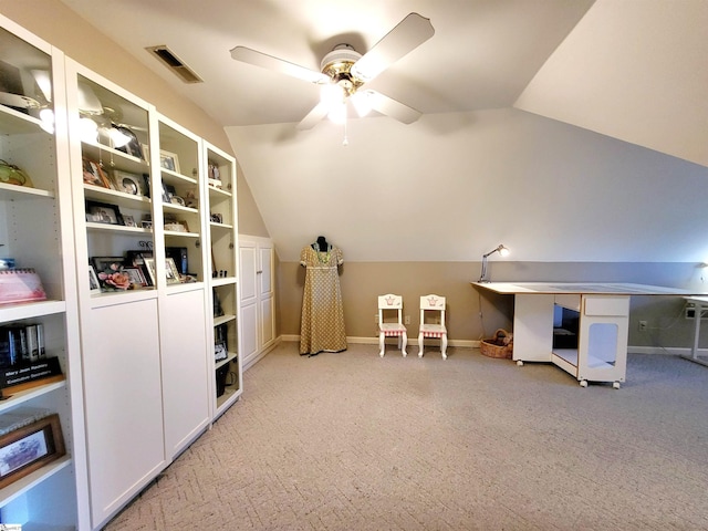 bonus room featuring ceiling fan, light carpet, and lofted ceiling