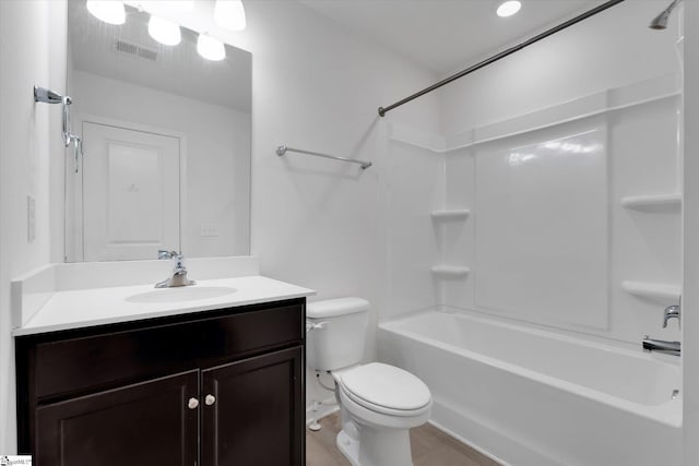 full bathroom with vanity, toilet, and tub / shower combination