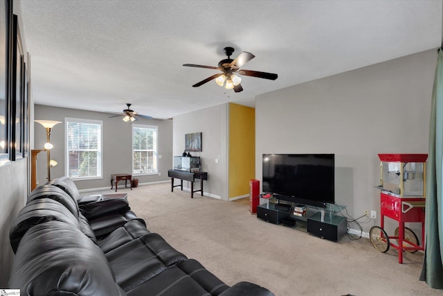 living room featuring carpet flooring and ceiling fan