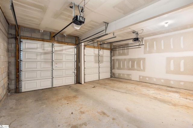 garage featuring a garage door opener