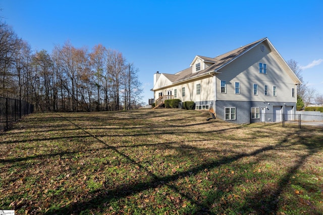 view of home's exterior featuring a yard