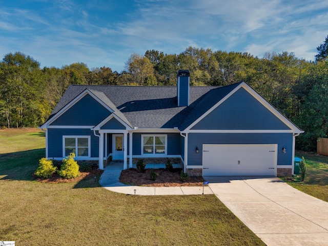 craftsman-style home with a garage and a front lawn