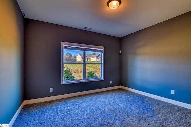 unfurnished room featuring carpet floors