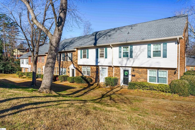 view of front of home featuring a front lawn