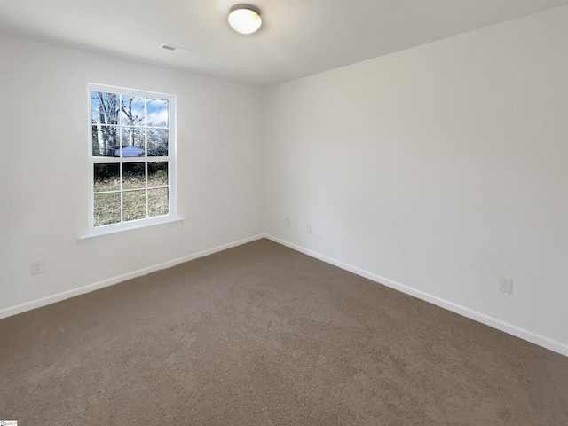 unfurnished room with carpet