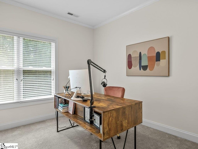 carpeted home office with plenty of natural light and crown molding