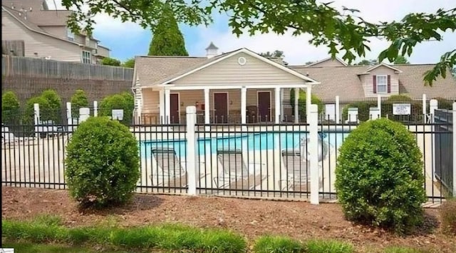 view of swimming pool with a patio area