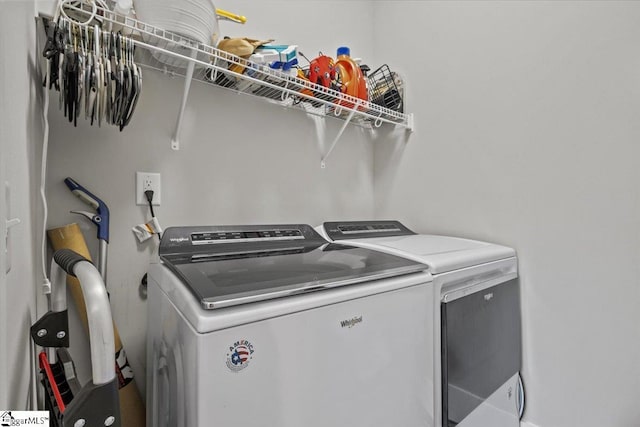 washroom featuring independent washer and dryer