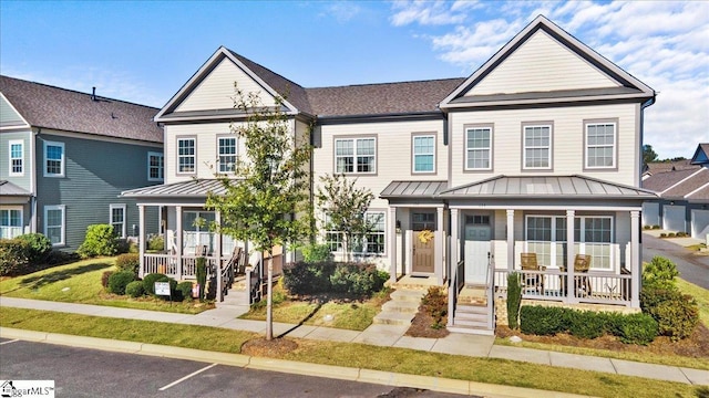 view of front of home featuring covered porch