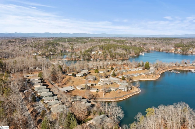 bird's eye view with a water and mountain view