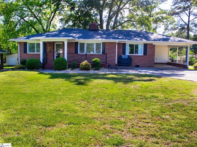 ranch-style home with a front yard and a carport