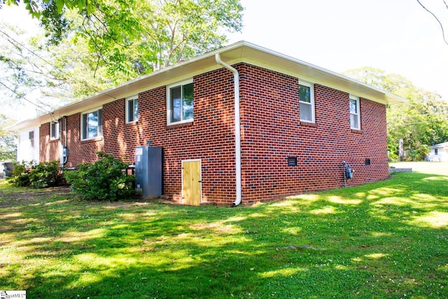 view of property exterior featuring a yard