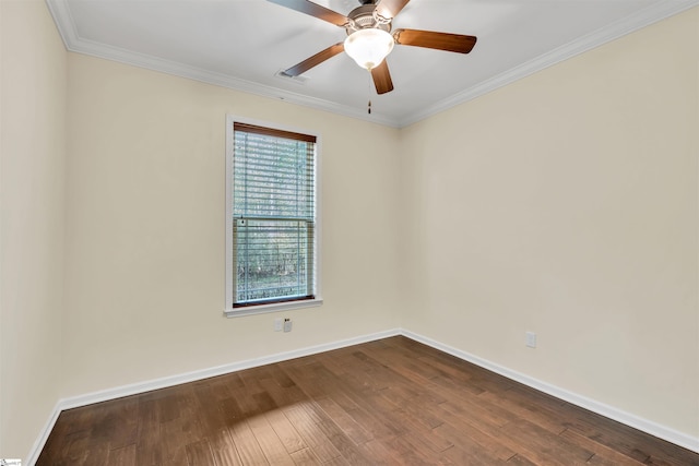 spare room featuring hardwood / wood-style flooring, ceiling fan, and ornamental molding