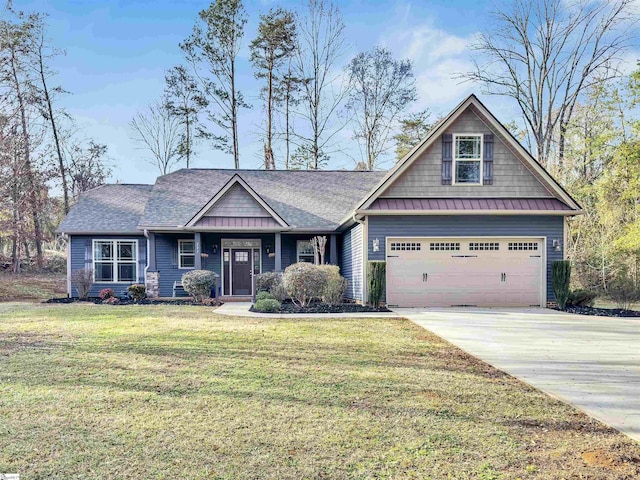 craftsman-style house with a garage and a front lawn