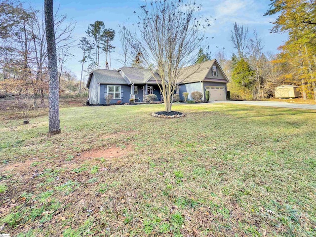 ranch-style home with a front yard and a garage