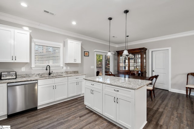 kitchen with stainless steel dishwasher, dark wood-type flooring, decorative light fixtures, white cabinets, and a kitchen island