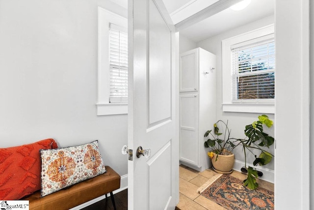 sitting room with light tile patterned flooring