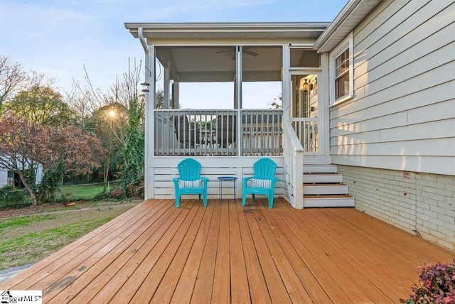 wooden terrace featuring a sunroom