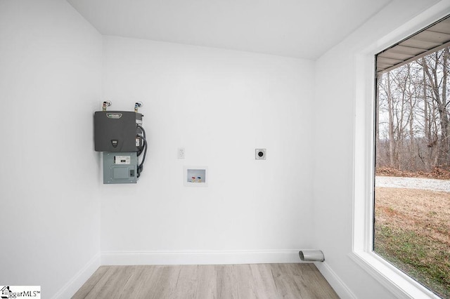 laundry room featuring hookup for an electric dryer, hookup for a washing machine, and light wood-type flooring