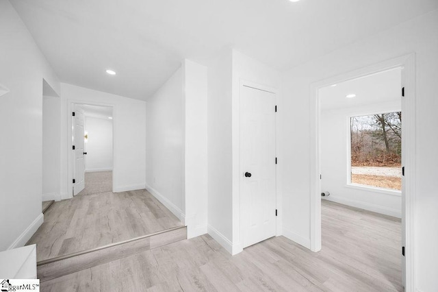 hallway featuring light hardwood / wood-style flooring