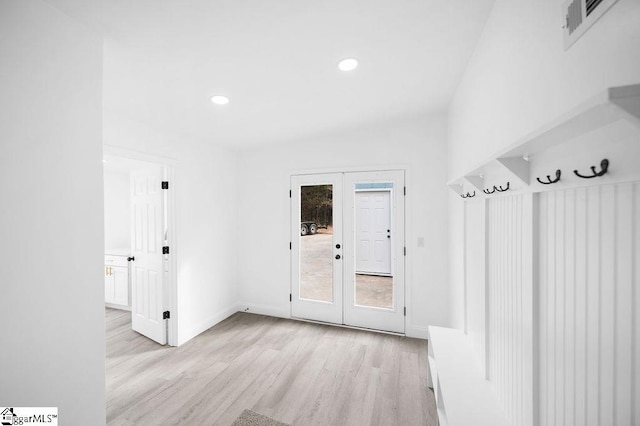 mudroom featuring french doors and light wood-type flooring