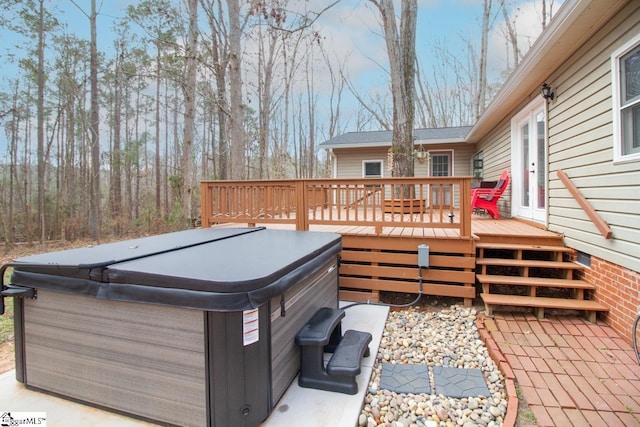 deck with a hot tub