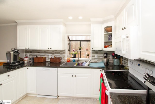 kitchen featuring electric range, dishwasher, white cabinets, and sink