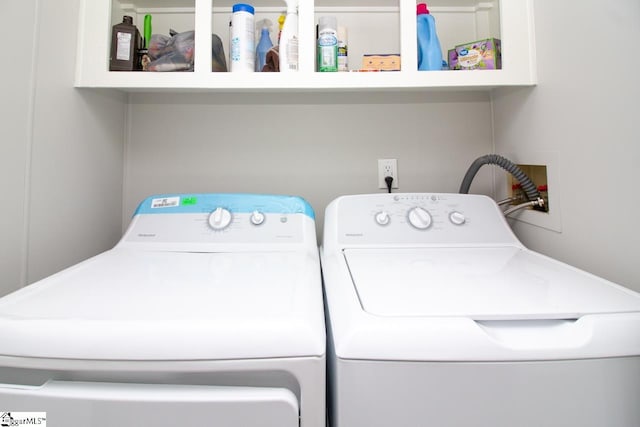 washroom featuring separate washer and dryer